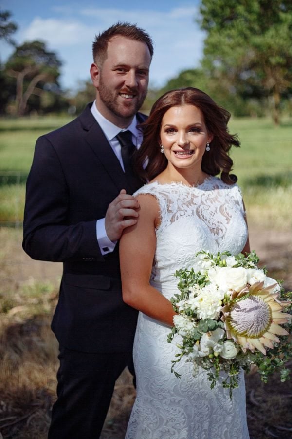 Ashleigh and Mitch's wedding day in Baxter, frame 178