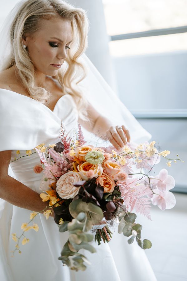 Emmett and Karmen's wedding day in St Kilda, frame 022