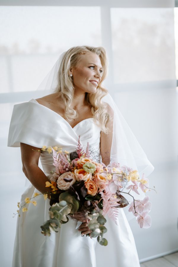 Emmett and Karmen's wedding day in St Kilda, frame 025
