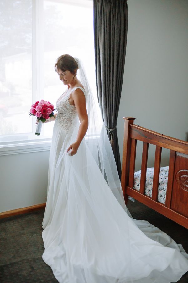 Tania and Jamie's wedding day in Kings Meadows, frame 037