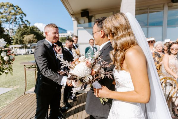 Liana and Matt's wedding day in Albert Park, frame 034