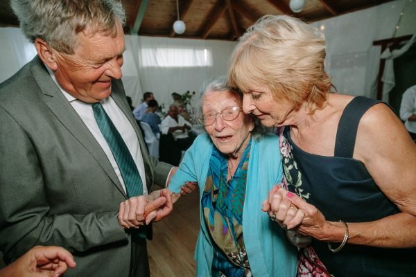 St Andrews Beach Recreation Hall wedding, Simone and Sam, frame 330
