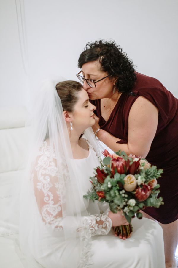 Charlotte and Daniel's wedding day in Burwood East, frame 028