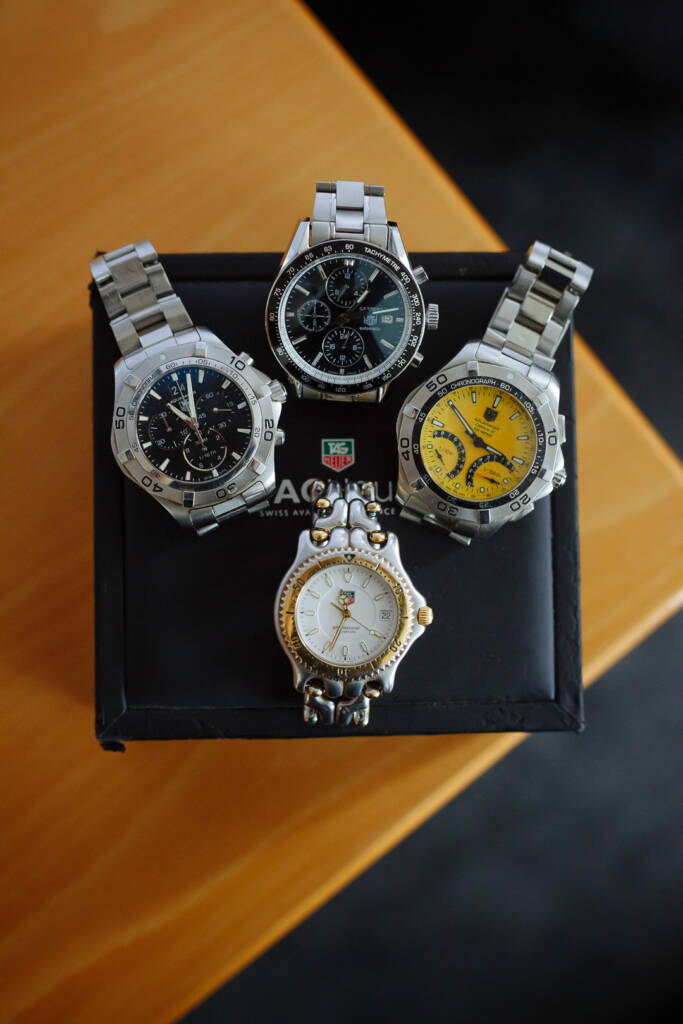 Four watches stand ready on their presentation box