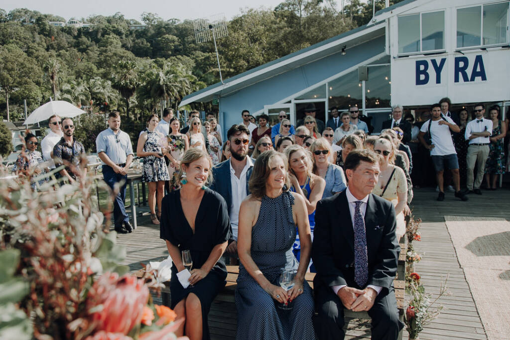 Seated guests watch the ceremony on BYRA’s timber deck.