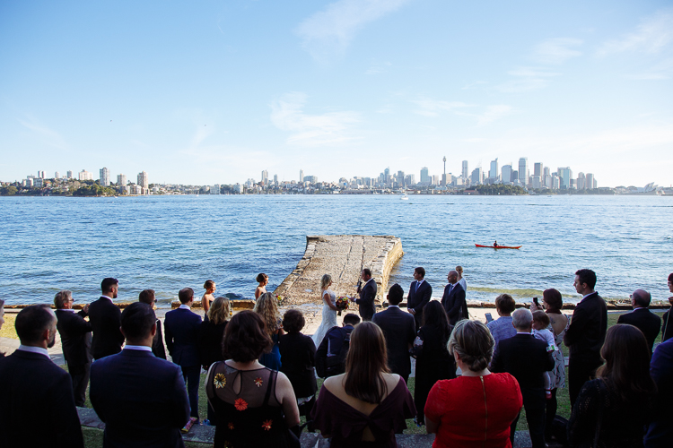 Wide view of Sabine and Arthur's waterside wedding at Bradleys Head on Sydney's North Shore