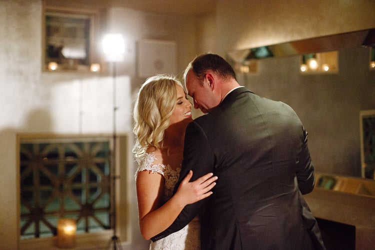 Sabine and Arthur touch foreheads as they dance together at Bathers'