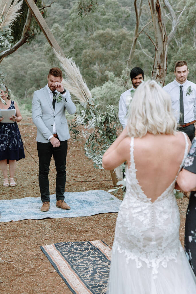 Tory wipes his eye as Kelly approaches the ceremony arbour at Sunnystones.
