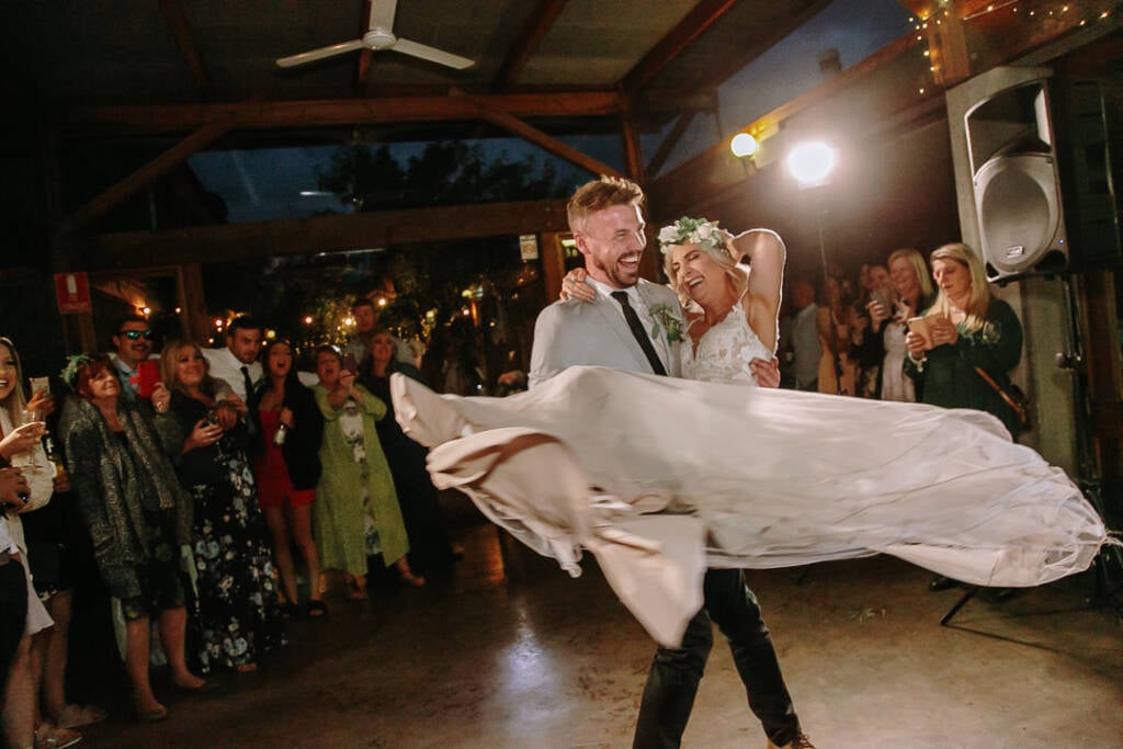 Tory lifts Kelly during their dance, her skirt spreading out across the Camp Sunnystones dance floor.