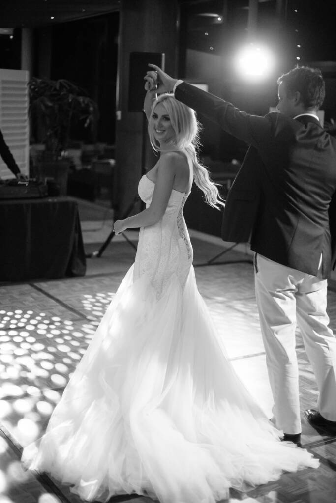 Nick twirls Aasher on The National's parquet dance floor, her train fanning wide.