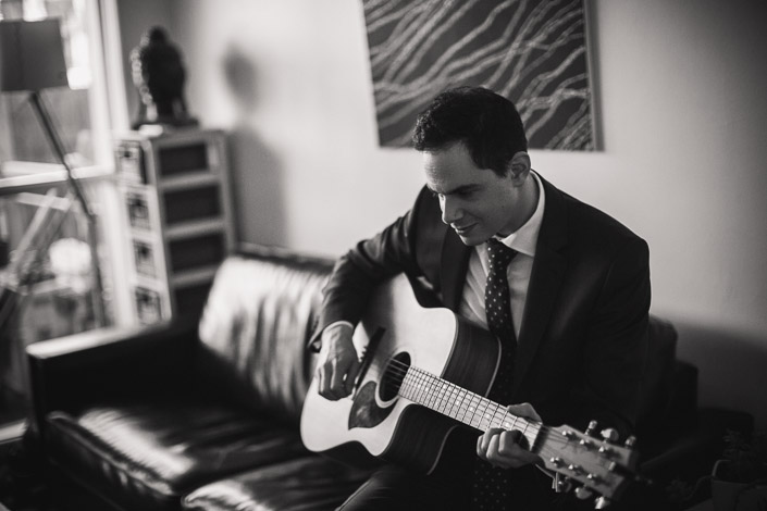 A quiet acoustic strum on the couch before leaving