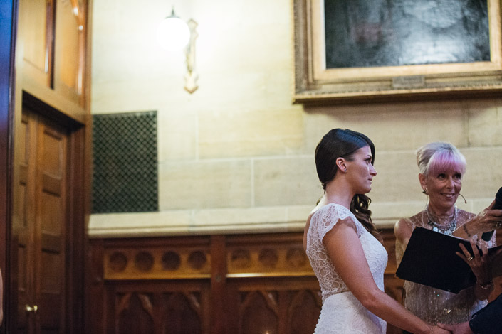 Pascale holds Pasquale's hands beside the celebrant at The Chapter House.