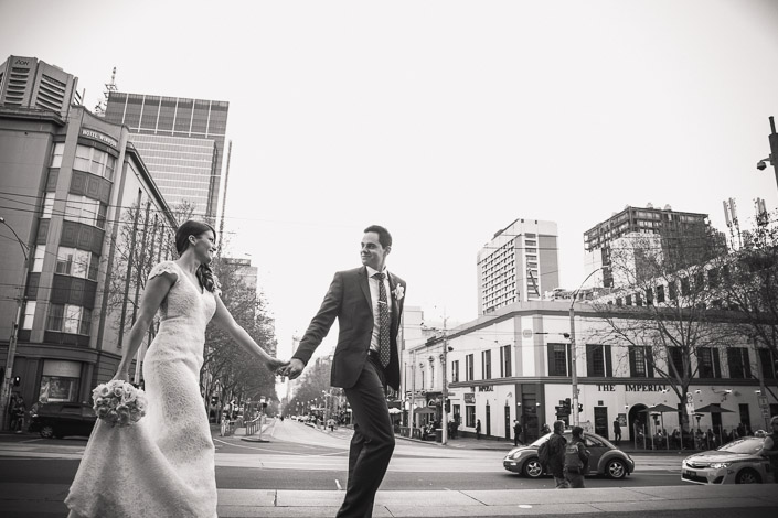 Pascale and Pasquale hold hands near the Imperial in Melbourne CBD.