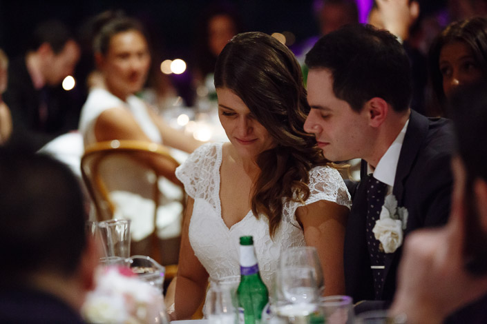 Pascale and Pasquale lean close at their reception table at The Boulevard Restaurant and Functions.