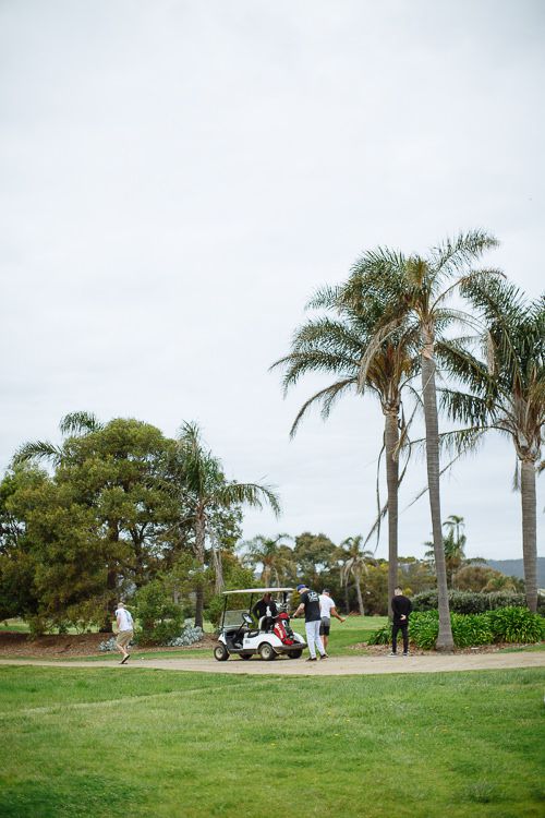 Palm trees over the golf course on the morning of the wedding