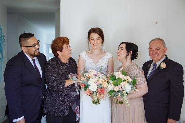 Family gathered around the bride before leaving for Stillwater at Crittenden