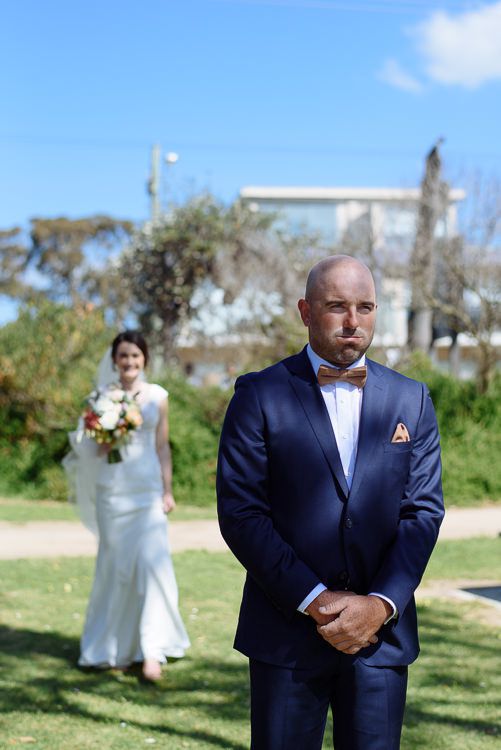Bride approaching the groom for their first look on the Dromana foreshore