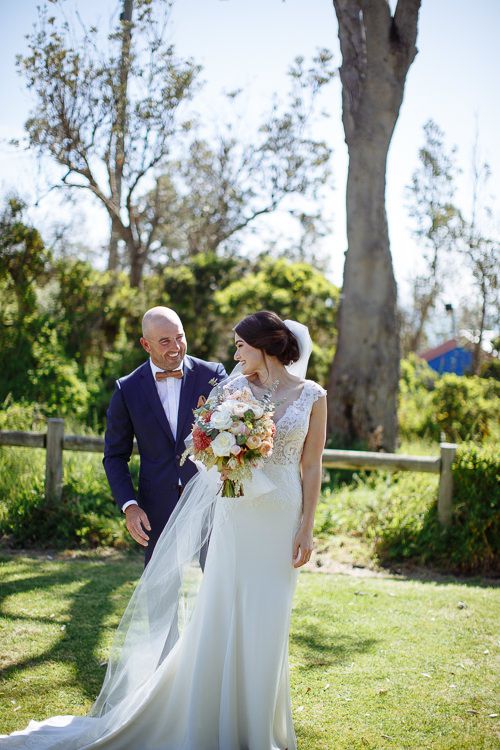 Couple sharing a laugh after the first look, Mornington Peninsula