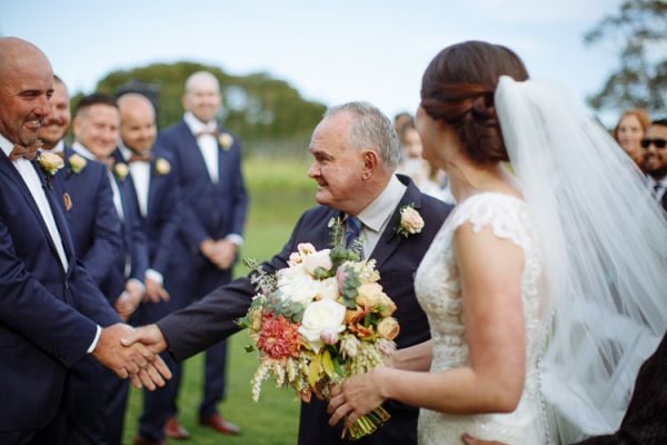 Exchanging vows at the lakeside ceremony, Stillwater at Crittenden