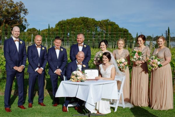 Caitlin and Brad during their lakeside wedding ceremony