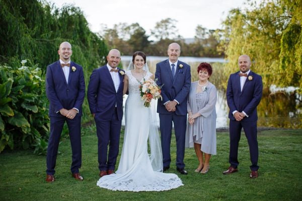 Caitlin and Brad during their lakeside wedding ceremony