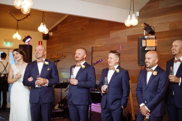 Guests laughing during the wedding speeches