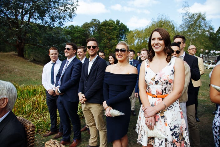 Sunglasses and smiles across the front row of the lawn