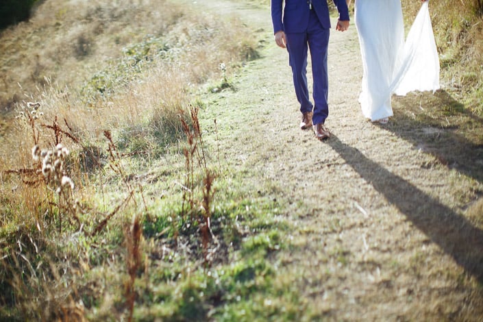 Long shadows fall across the Pennyroyal Retreat path as the couple walk hand in hand