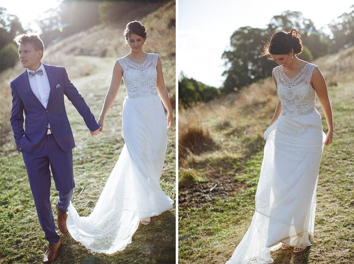 Two frames: the groom looks away up the hill, and the bride studies her hem on the grass.