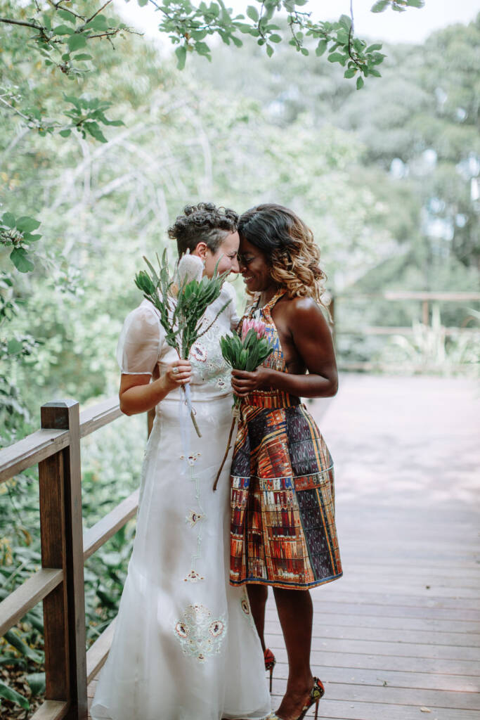 Sarah and an attendant touch foreheads on the verandah at Strathvea Guesthouse.