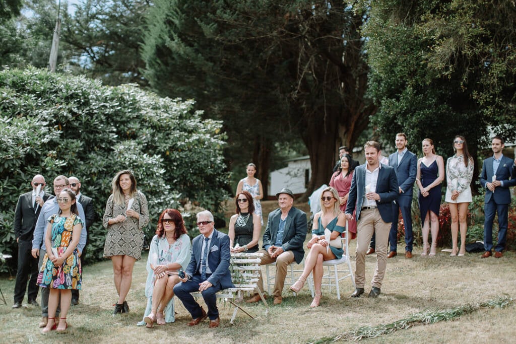 Guests watch the outdoor ceremony at Strathvea Guesthouse.