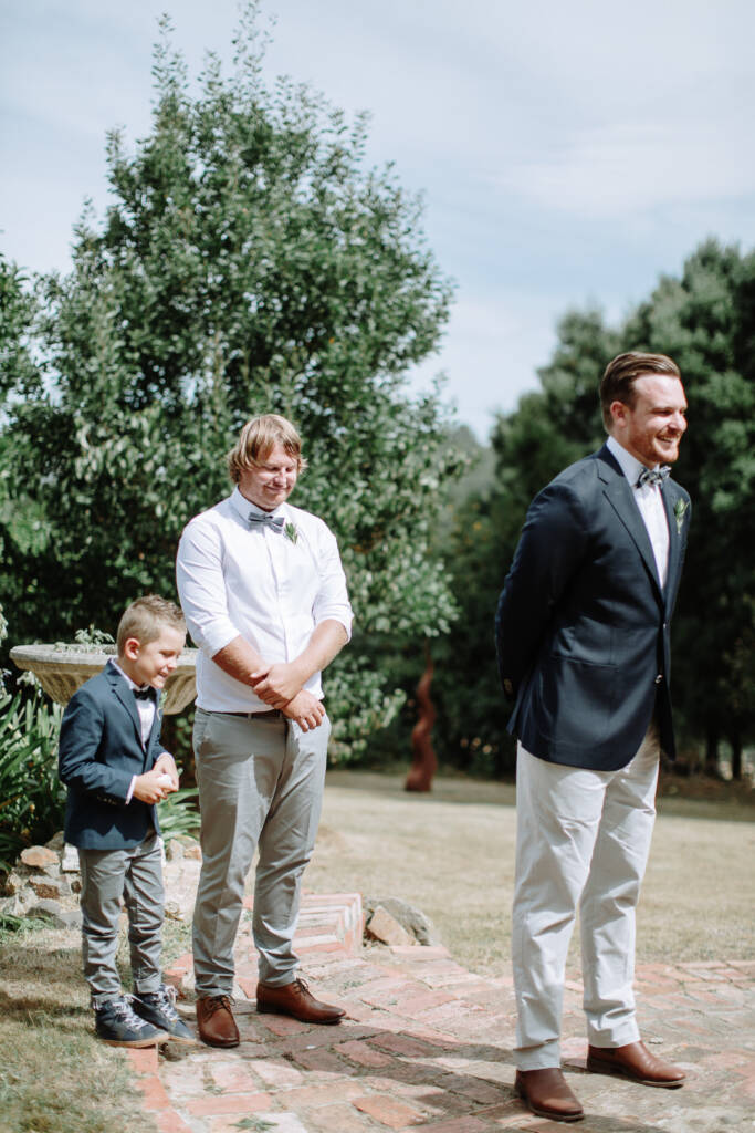 Jye listens to Sarah during their outdoor ceremony at Strathvea.