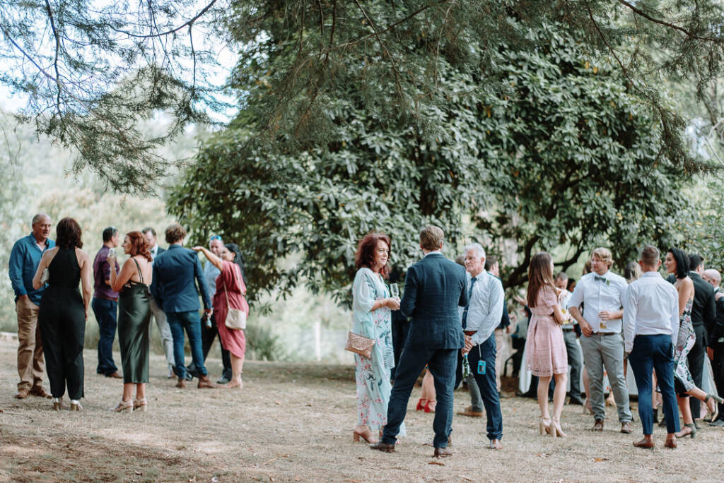 Guests mingle outdoors at Strathvea after the ceremony.