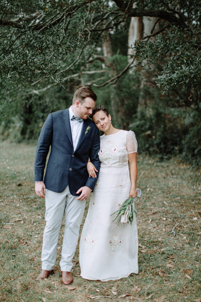 Sarah rests her head against Jye during a close couple portrait.