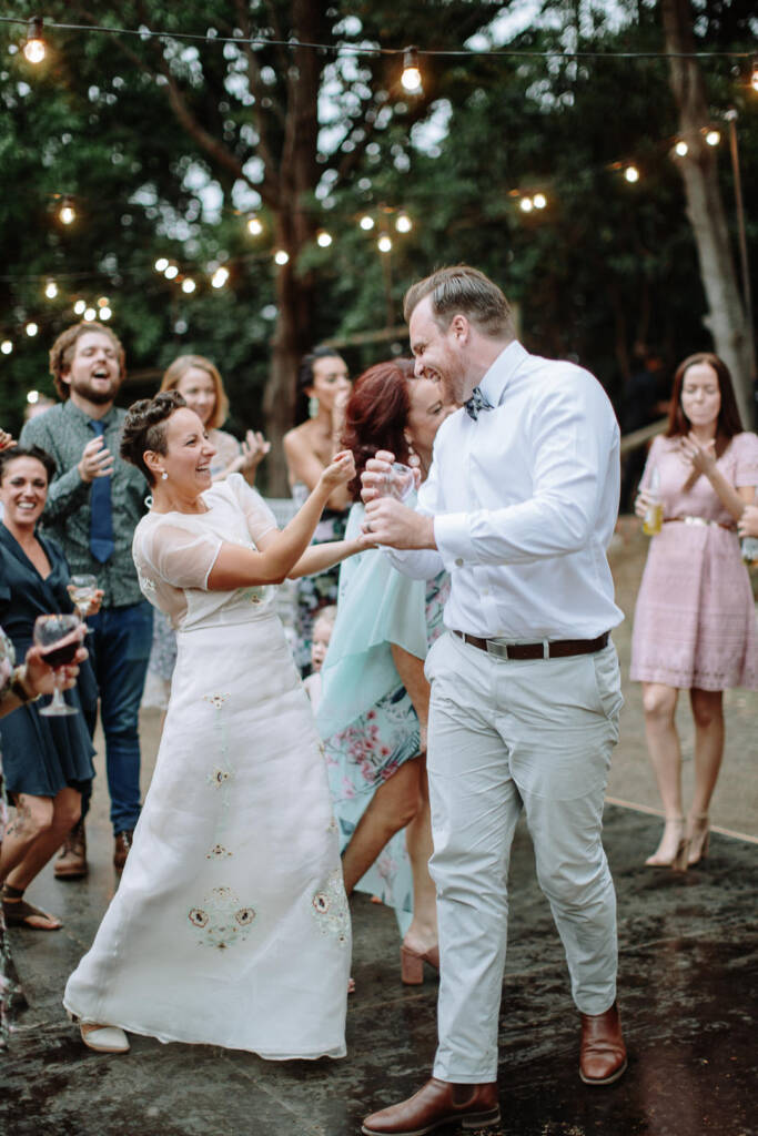 The couple dance with their guests at the outdoor reception at Strathvea.