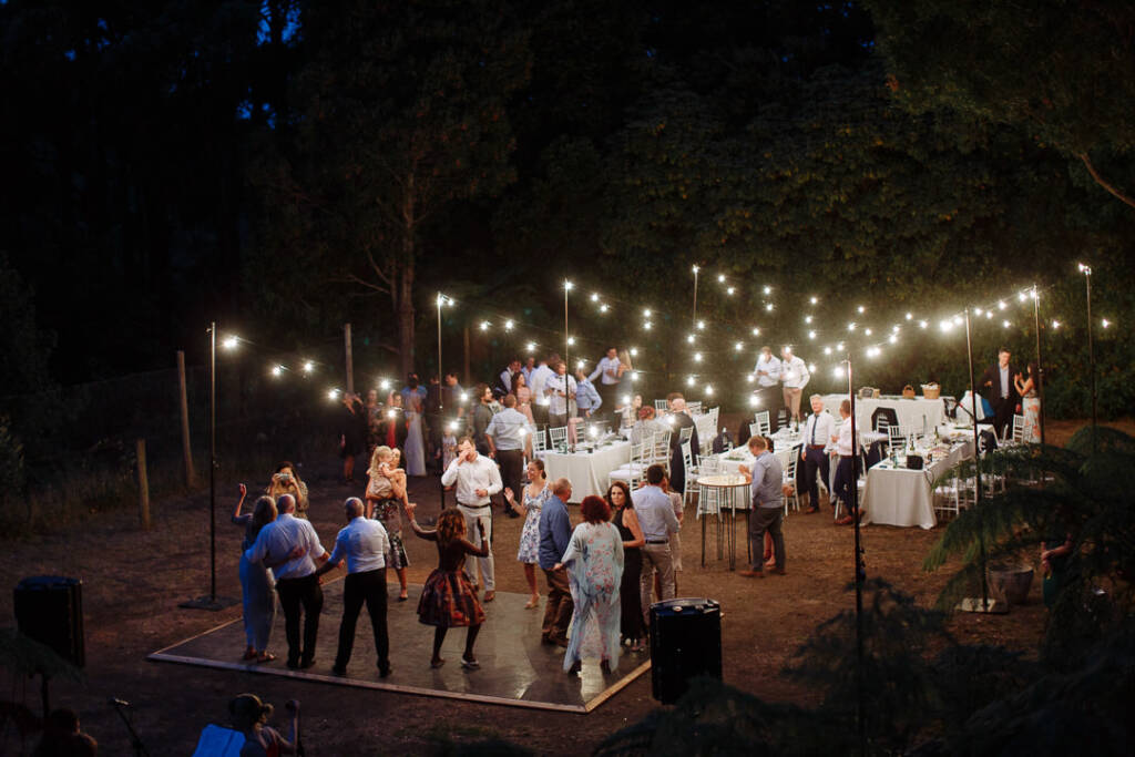 An elevated night view shows the alfresco reception and dance floor at Strathvea Guesthouse.