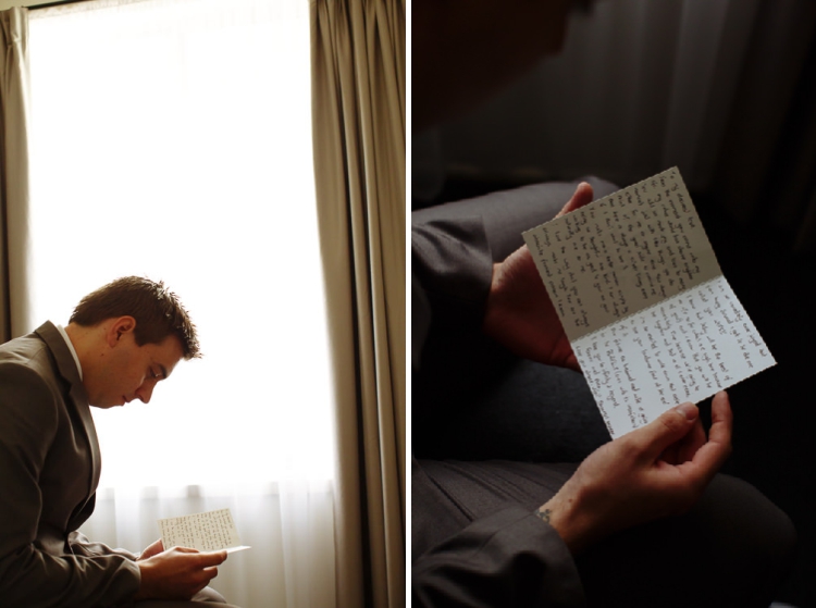 Two frames, Luke in his grey suit reading a handwritten card before a window, then the card close.