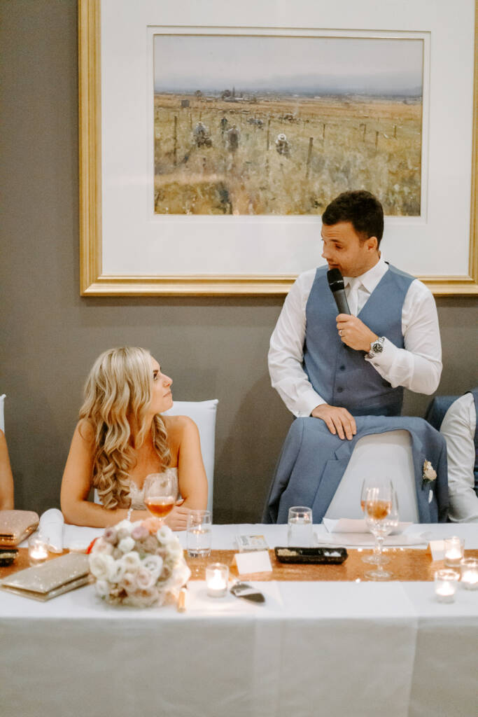 Watch flashing, the groom works through his list of thank-yous