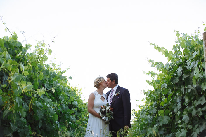A kiss between walls of vine leaves at Yering Farm