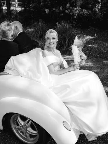 The bride arriving by vintage car at InterContinental Sanctuary Cove, Gold Coast