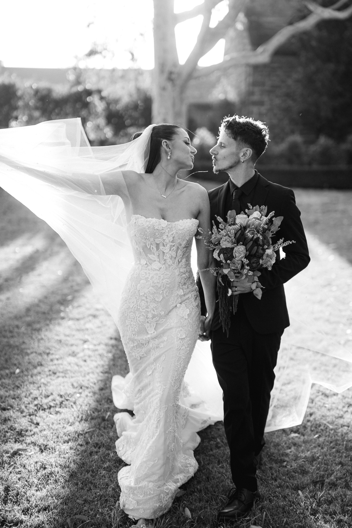 Veil catching the wind as they walk the lawn at Meadowbank Estate, Melbourne