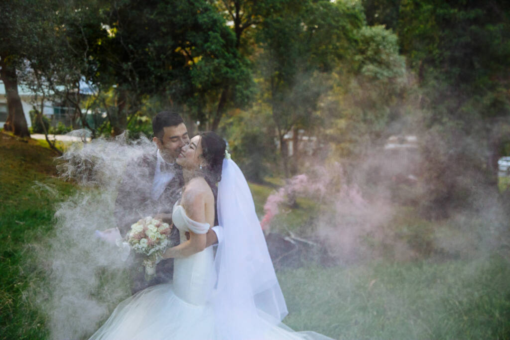 Haze drifts through the garden as Raj kisses Shermaine in the Dandenong Ranges