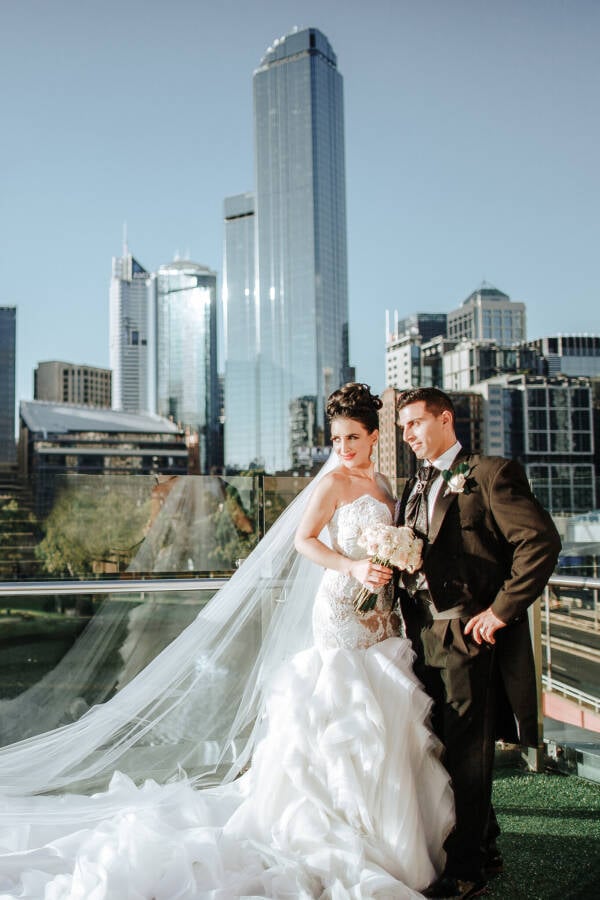 Danielle and Michael on the Crown Towers rooftop, Melbourne Crown Towers Melbourne Wedding Photo Melbourne CBD