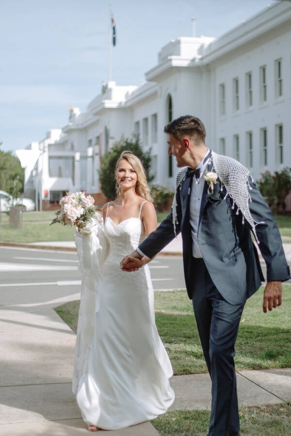 Becky and George's wedding portrait outside Old Parliament House Old Parliament House Gardens Wedding Photo Canberra CBD