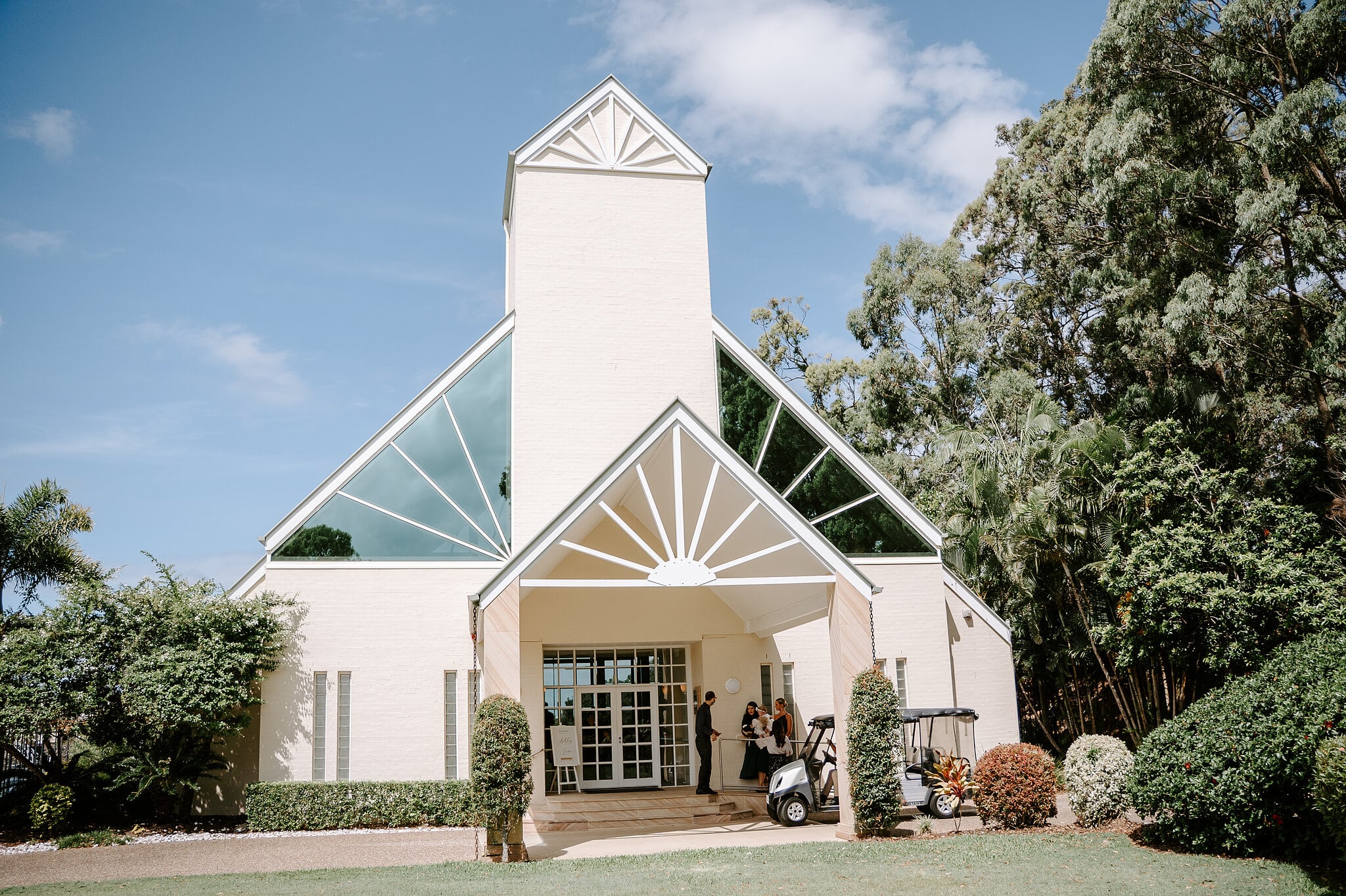 The Wedding Chapel at InterContinental Sanctuary Cove Resort under a clear summer sky.