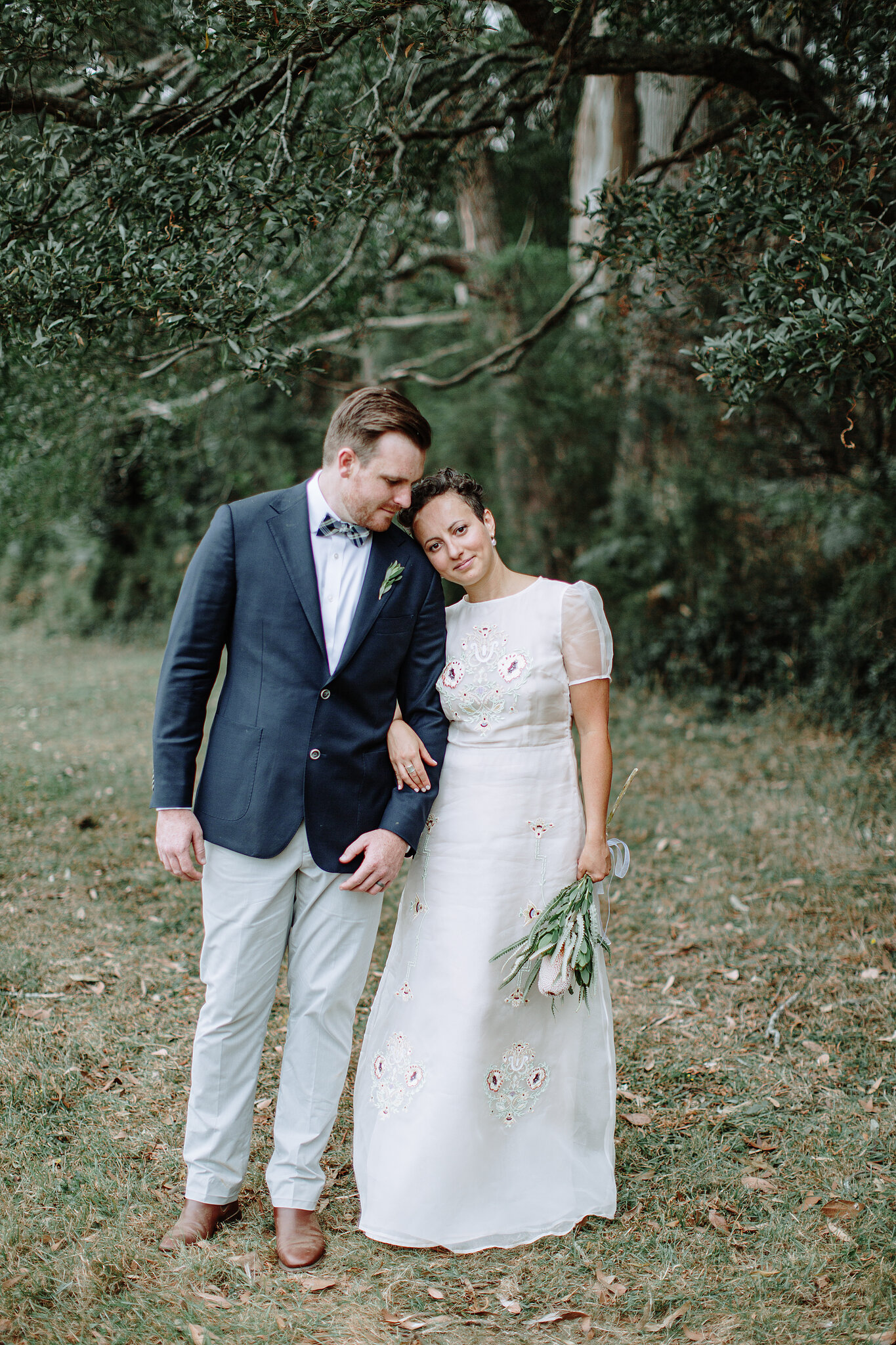 Sarah and Jye beneath the trees at Strathvea Guesthouse, Yarra Valley Strathvea Guesthouse Wedding Photo Yarra Valley