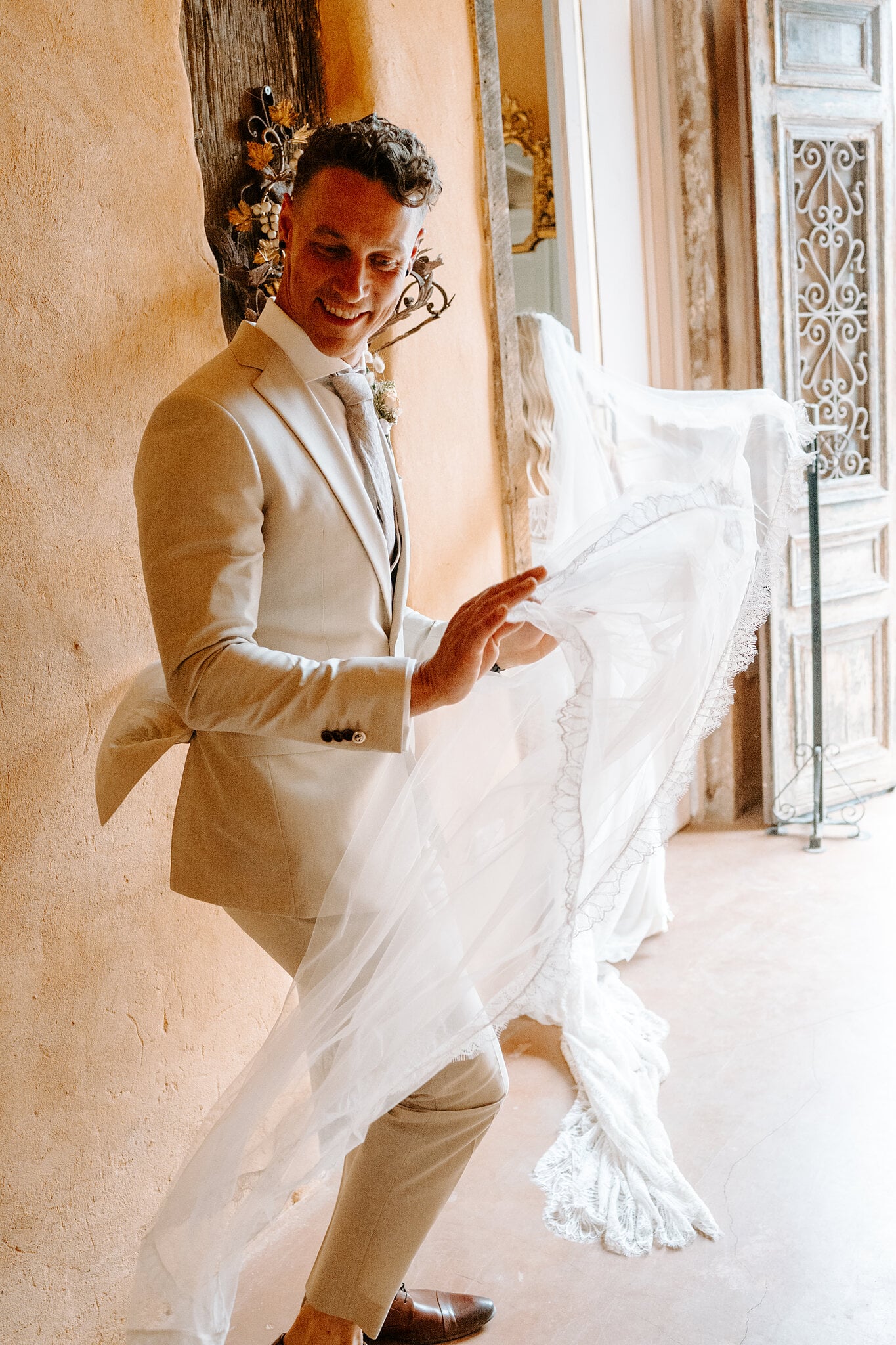 Harrison dances along the hallway as Samantha’s veil flies out behind him.