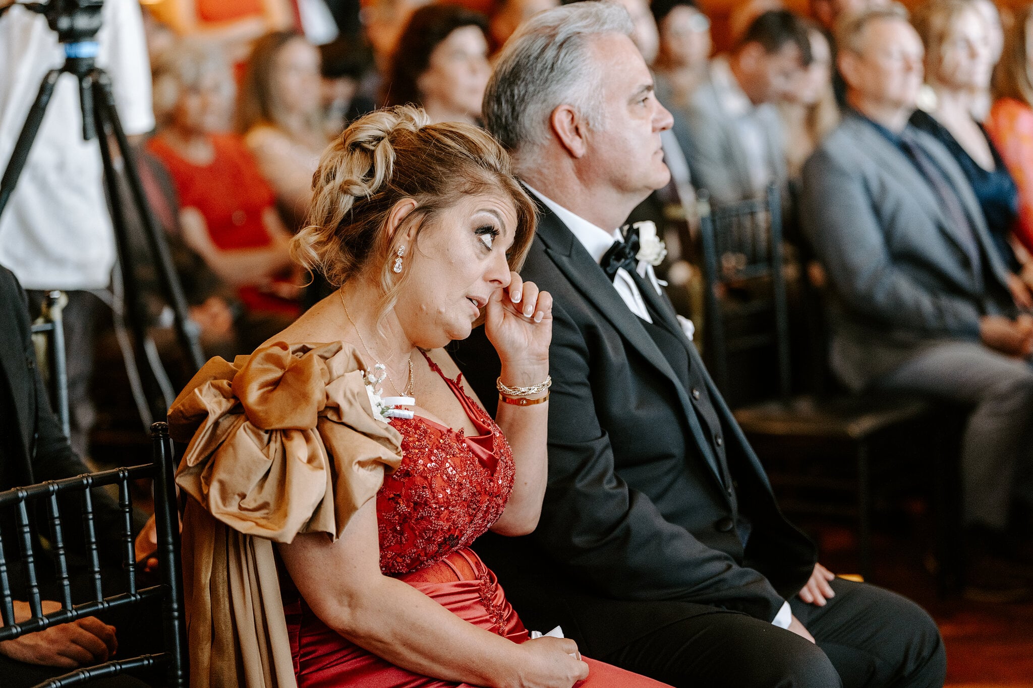 Jordan’s mum wipes away a happy tear during the ceremony at The Island Gold Coast.